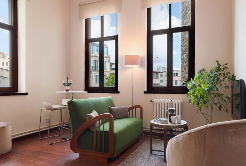 Furnished three bedroom apartment for residential rent with high ceilings, located right next to Galata Tower in Istanbul.